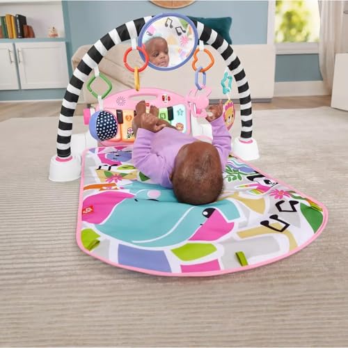 Fisher-Price Glow & Grow Kick and Play Gym - Pink Baby Playmat with 4 Ways to Play, Smart Stages Learning, 10 Linkable Toys, and Removable Piano for Newborn and Up